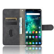 For TCL 10 Pro Solid Color Skin Feel Magnetic Buckle Horizontal Flip Calf Texture PU Leather Case with Holder & Card Slots & Wallet(Black)