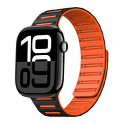 For Apple Watch 42mm / 41mm / 40mm / 38mm Cylinder Magnetic Two-color Loop Silicone Watch Band(Black Orange)