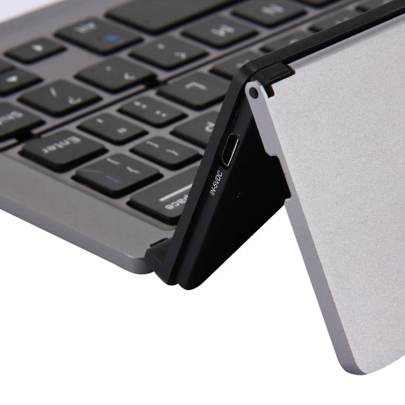 F18 Ultra-slim Rechargeable Foldable 58 Keys Bluetooth Wireless Keyboard with Holder (Grey)