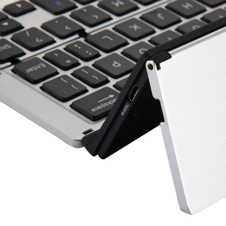 F18 Ultra-slim Rechargeable Foldable 58 Keys Bluetooth Wireless Keyboard with Holder (Silver)