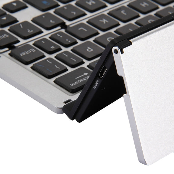 F18 Ultra-slim Rechargeable Foldable 58 Keys Bluetooth Wireless Keyboard with Holder (Silver)