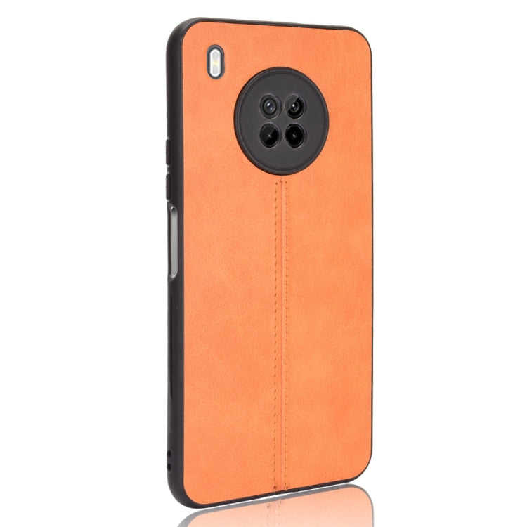 For Huawei Y9a Shockproof Sewing Cow Pattern Skin PC + PU + TPU Case(Orange)