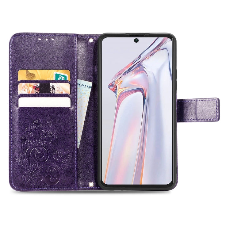 For Blackview A100 Four-leaf Clasp Embossed Buckle Mobile Phone Protection Leather Case with Lanyard & Card Slot & Wallet & Bracket Function(Purple)