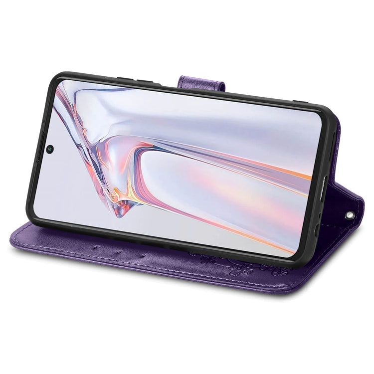 For Blackview A100 Four-leaf Clasp Embossed Buckle Mobile Phone Protection Leather Case with Lanyard & Card Slot & Wallet & Bracket Function(Purple)