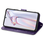 For Blackview A100 Four-leaf Clasp Embossed Buckle Mobile Phone Protection Leather Case with Lanyard & Card Slot & Wallet & Bracket Function(Purple)