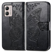 For Motorola Moto E13 Butterfly Love Flower Embossed Flip Leather Phone Case(Black)