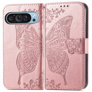For Google Pixel 9 Butterfly Love Flower Embossed Leather Phone Case(Rose Gold)