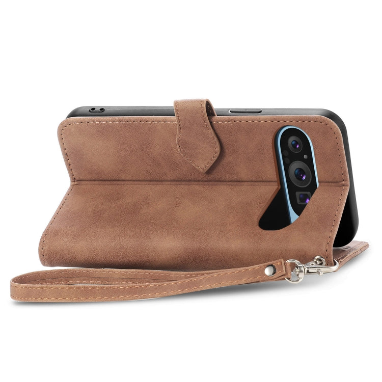 For Google Pixel 9 Pro Embossed Flower Zipper Leather Phone Case(Brown)