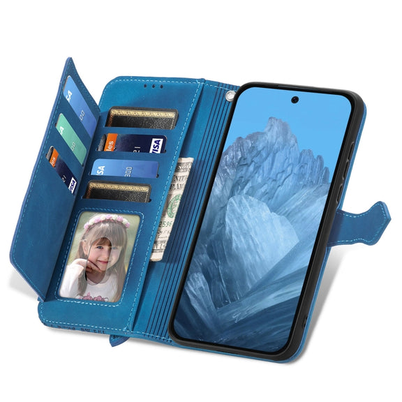 For Google Pixel 9 Pro Embossed Flower Zipper Leather Phone Case(Blue)