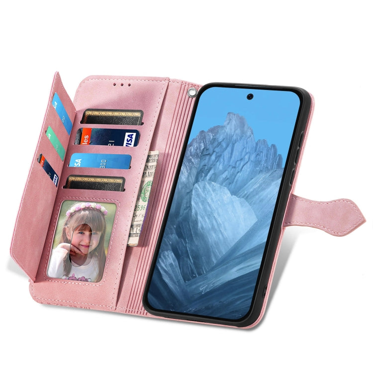 For Google Pixel 9 Pro Embossed Flower Zipper Leather Phone Case(Pink)