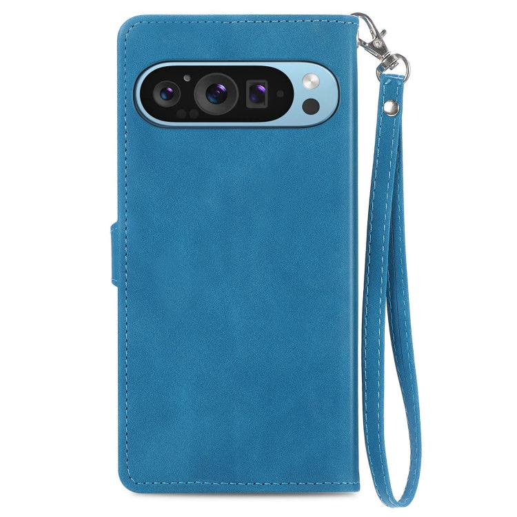 For Google Pixel 9 Embossed Flower Zipper Leather Phone Case(Blue)