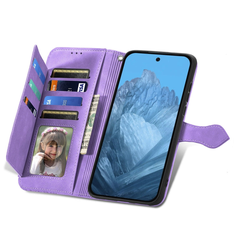 For Google Pixel 9 Embossed Flower Zipper Leather Phone Case(Purple)