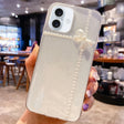 For iPhone 16 Pearl Bow Glitter Epoxy TPU Phone Case(Cross Knots) - iPhone 16 Cases by PMC TechLife | Online Shopping South Africa | PMC TechLife | Buy Now Pay Later Mobicred