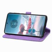 For Motorola Edge 2024 Embossed Flower Zipper Leather Phone Case(Purple)