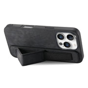 For iPhone 16 Pro Retro Wristband Holder Leather Back Phone Case(Black)