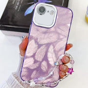 For iPhone 16e Plating Glitter Texture Chain Wristband TPU Phone Case with Lens Film(Purple Feathers)
