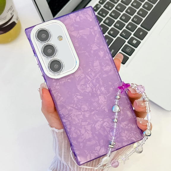 For Samsung Galaxy S25 5G Plating Glitter Texture Chain Wristband TPU Phone Case with Lens Film(Purple Shell Pattern)