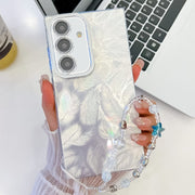 For Samsung Galaxy S25 5G Plating Glitter Texture Chain Wristband TPU Phone Case with Lens Film(White Feathers)