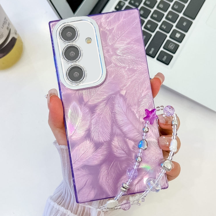 For Samsung Galaxy S25 5G Plating Glitter Texture Chain Wristband TPU Phone Case with Lens Film(Purple Feathers)
