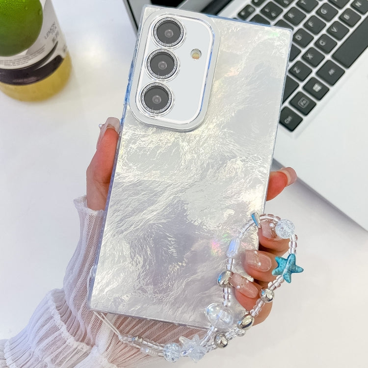 For Samsung Galaxy S25 5G Plating Glitter Texture Chain Wristband TPU Phone Case with Lens Film(White Tinfoil Texture)