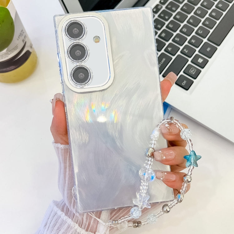 For Samsung Galaxy S25+ 5G Plating Glitter Texture Chain Wristband TPU Phone Case with Lens Film(White Feather Yarn)