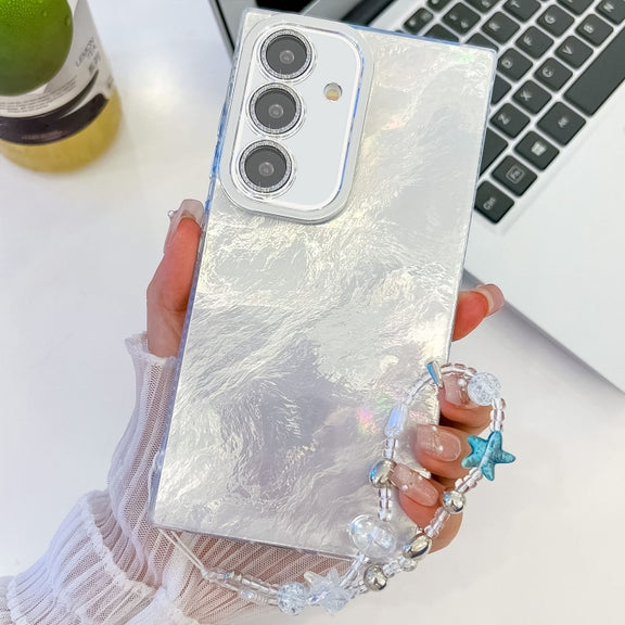 For Samsung Galaxy S25+ 5G Plating Glitter Texture Chain Wristband TPU Phone Case with Lens Film(White Tinfoil Texture)