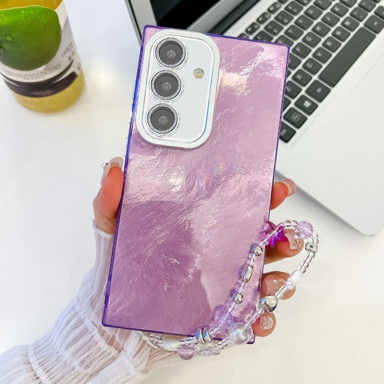 For Samsung Galaxy S25+ 5G Plating Glitter Texture Chain Wristband TPU Phone Case with Lens Film(Purple Tinfoil Texture)