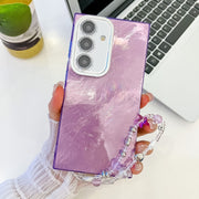 For Samsung Galaxy S25+ 5G Plating Glitter Texture Chain Wristband TPU Phone Case with Lens Film(Purple Tinfoil Texture)