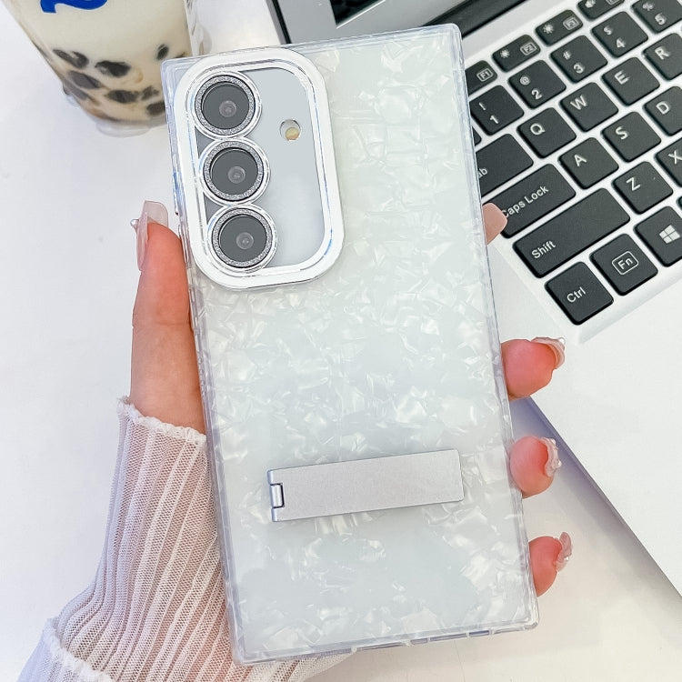 For Samsung Galaxy S25+ 5G Plating Glitter Texture Fold Holder TPU Phone Case with Lens Film(White Shell Pattern)