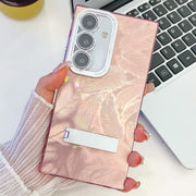 For Samsung Galaxy S25+ 5G Plating Glitter Texture Fold Holder TPU Phone Case with Lens Film(Pink Feathers)