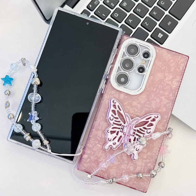 For Samsung Galaxy S25+ 5G Plating Glitter Lens Film Texture Butterfly Holder Wristband Phone Case(Pink Shell Pattern)