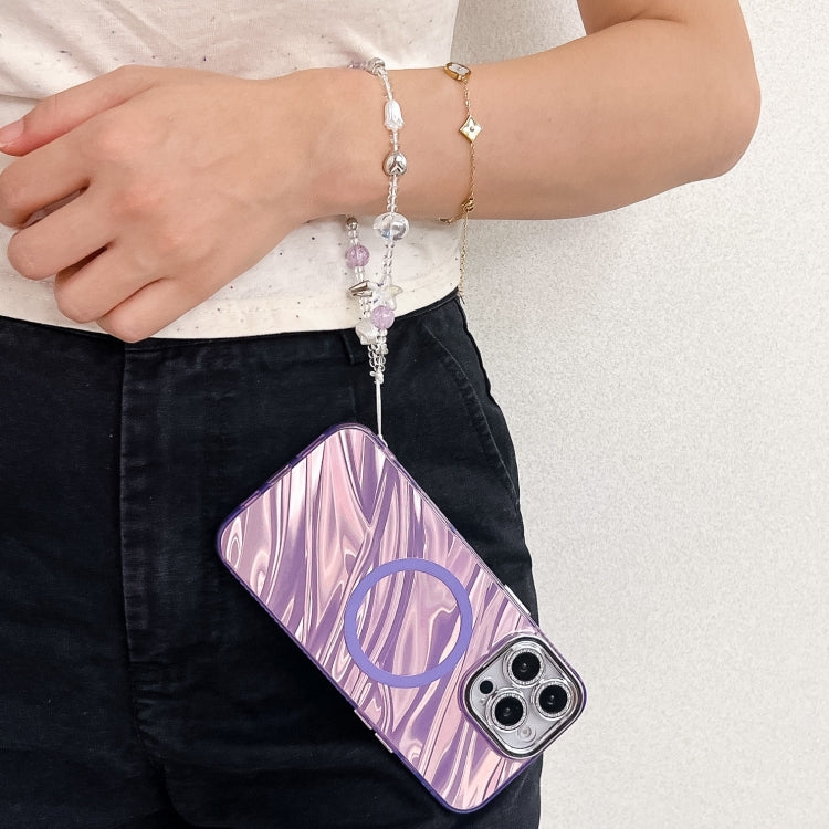 For iPhone 16 Plus Plating Texture Wristband MagSafe TPU Phone Case with Glitter Lens Film(White Shell Pattern)