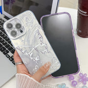 For iPhone 16e Plating Texture Butterfly Wristband TPU Phone Case with Glitter Lens Film(Pink Butterflies HU5)