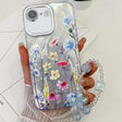For iPhone 16e Electroplating Flowers Plants Texture Wristband TPU Phone Case(Wildflower FL2) - iPhone 16e Cases by PMC TechLife | Online Shopping South Africa | PMC TechLife | Buy Now Pay Later Mobicred
