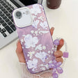 For iPhone 16e Electroplating Flowers Plants Texture Wristband TPU Phone Case(Pale Purple FlowerFL11) - iPhone 16e Cases by PMC TechLife | Online Shopping South Africa | PMC TechLife | Buy Now Pay Later Mobicred