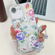 For iPhone 16e Electroplating Flowers Plants Texture Wristband TPU Phone Case(Peony FL14)