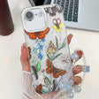 For iPhone 16e Electroplating Flowers Plants Texture Wristband TPU Phone Case(Butterfly Love Flower FL17) - iPhone 16e Cases by PMC TechLife | Online Shopping South Africa | PMC TechLife | Buy Now Pay Later Mobicred