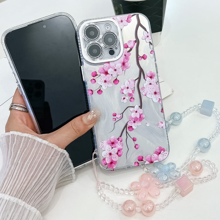 For iPhone 16e Electroplating Flowers Plants Texture Wristband TPU Phone Case(Peach Blossom FL18)