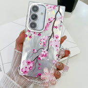 For Samsung Galaxy S25 5G Electroplating Flowers Plants Texture Wristband TPU Phone Case(Plum Flower FL6)