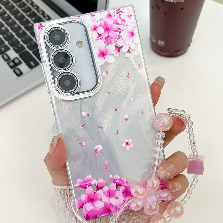 For Samsung Galaxy S25+ 5G Electroplating Flowers Plants Texture Wristband TPU Phone Case(Sakura FL12)