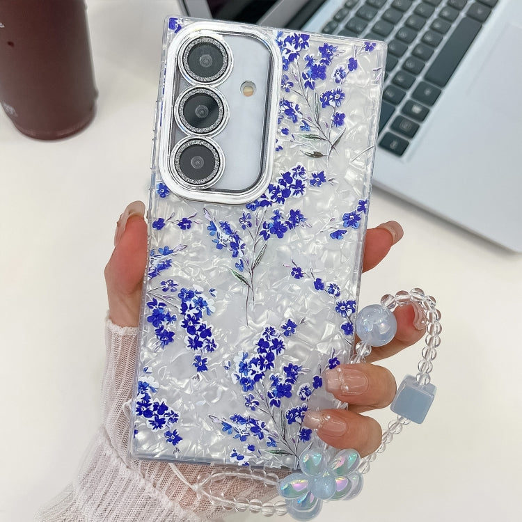 For Samsung Galaxy S25+ 5G Electroplating Flowers Plants Texture Wristband TPU Phone Case(Blue Flower FL13)