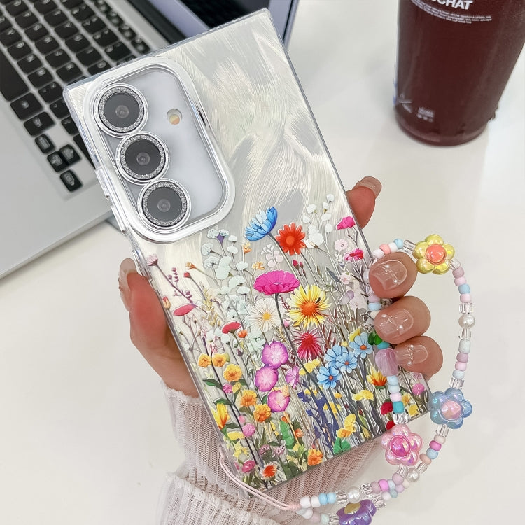 For Samsung Galaxy S25+ 5G Electroplating Flower Texture Wristband TPU Phone Case(Flowers SH4)