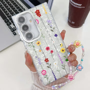 For Samsung Galaxy S25+ 5G Electroplating Flower Texture Wristband TPU Phone Case(Yellow Wildflower SH6)