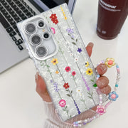 For Samsung Galaxy S25 Ultra 5G Electroplating Flower Texture Wristband TPU Phone Case(Yellow Wildflower SH6)