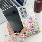 For Samsung Galaxy S25+ 5G Electroplating Flower Texture Wristband TPU Phone Case(Red Plum Blossom SH2)