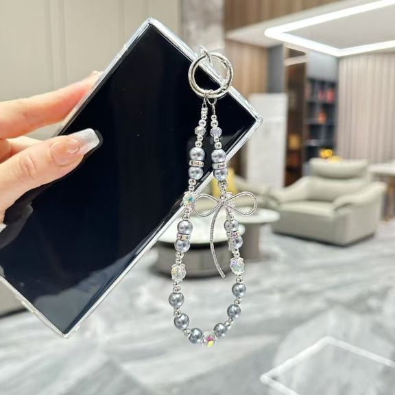 For Samsung Galaxy S25 5G Little Fresh Bow Bracelet Chain TPU Phone Case(Black)