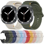 For Samsung Galaxy Watch8 44mm Diamond Bezel and Wavy Grain Stitched Color Buckle Silicone Watch Band(Starlight Silver)