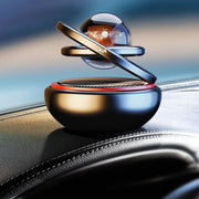 Interstellar Vast Solar Rotating Car Aromatherapy Ornaments, Color: Red