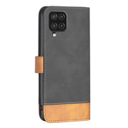 For Samsung Galaxy A12 BF11 Color Matching Skin Feel Leather Phone Case(Black)