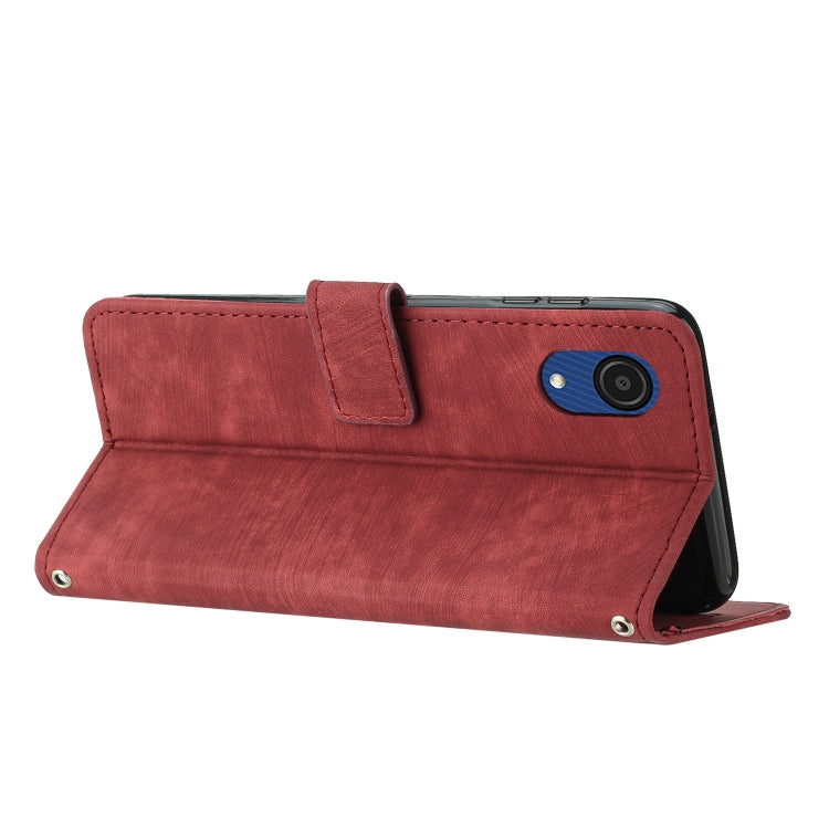 For Samsung Galaxy A03 Core Skin Feel Stripe Pattern Leather Phone Case with Lanyard(Red)